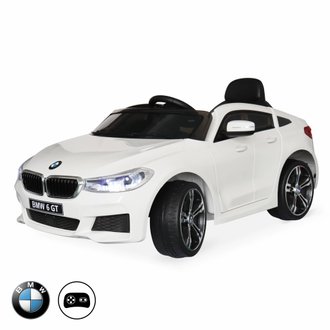 BMW Série 6 GT Gran Turismo blanche. voiture électrique pour enfants 12V 4 Ah. 1 place. avec autoradio et télécommande